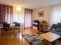 Vermietete 2-Zimmer-Wohnung in Freilassing – attraktive Kapitalanlage mit Balkon & 2 Stellplätzen - Wohnzimmer