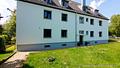 3-Zimmer-Wohnung mit 400 m² Gartenanteil, Sonnenterrasse und beheizten Hobby-Raum in Unterföhring! - Aussenansicht