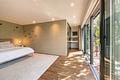 Einfamilien-Refugium mit Pool, Sauna, Fitness und geschützter Gartenidylle in isarnaher Villenlage - Masterbereich mit Ankleide
