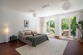 Ein familienfreundliches Haus mit außergewöhnlichem Grünblick, Garten und 2 TG-Plätze - nahe München - Luftige Größe, ruhig inszeniert