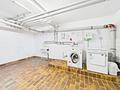 zur Kapitalanlage: Schöne Maisonette-Dachterrassenwohnung mit großem Ostbalkon in Taufkirchen - Waschraum 