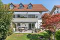 4-Zimmer-Gartenwohnung mit Südterrasse in Geretsried – Kapitalanlage mit unbefristetem Nießbrauch - Hausansicht - Süd