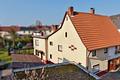 Doppelhaushälfte mit großem Garten & Ausbaupotenzial in begehrter Lage von Hemsbach - Hausansicht