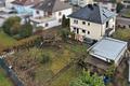 Großzügiges Einfamilienhaus mit individuellem Gestaltungspotenzial und traumhaftem Gartenhighlight - Haus und Gartenansicht