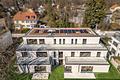 Erstbezug: Stilvolle 2-Zimmer-Gartenwohnung mit Terrasse und zauberhaftem West-Privatgarten - Hausansicht 1