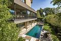 Architekten-Villa mit hochklassiger Ästhetik, Spa-Bereich und Pool in einzigartiger Lage - Die zeitlose Highend-Architektur liegt eingebettet in idyllischer Natur