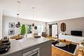 Architektur. Design. Weitblick. – Ein außergewöhnliches Zuhause mit traumhaftem Weitblick. - Küche / Wohnzimmer EG