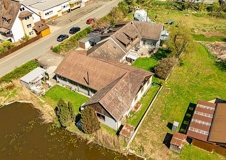 HEGERICH: Gewerbehalle mit Ausbau- und Nutzungspotenzial in gefragter Lage - Außenansicht
