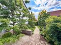 Traumhaftes Einfamilienhaus mit idyllischem Architektengarten - Zugang zum Garten