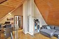 Attraktive Kapitalanlage: Vermietete 2-Zimmer-Wohnung mit Dachterrasse und 2 Stellplätzen - Wohnzimmer