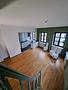 Haus im Haus! Große, denkmalgeschützte Altbauwohnung in der Augsburger Altstadt - Blick von der Treppe ins Wohnzimmer