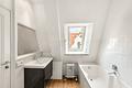Charmante 3,5-Zimmer-Wohnung mit sonniger Terrasse in Südausrichtung - Bad mit Wanne und Dusche