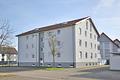 Herrlich große und helle Maisonette-Wohnung mit Balkon, Carport und Garage - Haus Eingangsseite