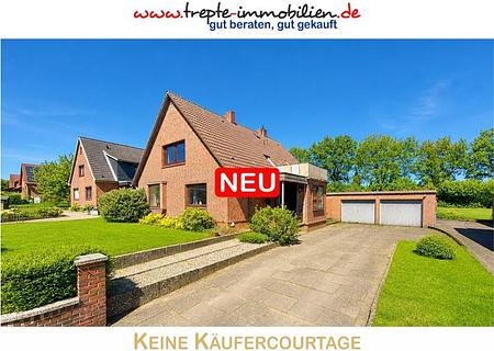 Vielseitiges Zweifamilienhaus mit großem Potenzial & teilbarem Grundstück - Hauptbild