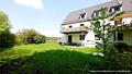 3-Zimmer-Wohnung mit 400 m² Gartenanteil, Sonnenterrasse und beheizten Hobby-Raum in Unterföhring! - Aussenansicht
