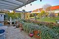 Familientraum in ruhiger Lage: Doppelhaushälfte mit Sonnengarten & Garage - renovierungsbedürftig - überdachte Terrasse EG
