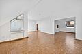 Moderne und lichtdurchflutete Dachgeschosswohnung  und großen Terrassen in Untergiesing - Großes Wohnzimmer