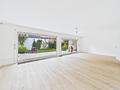 Attraktive Doppelhaushälfte mit großem Balkon, Garten und Terrasse in ruhiger Lage von Germering - Wohnzimmer