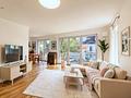 Wunderbar helle, moderne Traumwohnung in Obermenzing. Bezugsfrei! - Wohnzimmer (KI-möbliert)