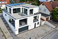 Individuelles Wohnkonzept mit großzügiger 4-PKW-Garage - Außenansicht