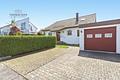 Gepflegtes Einfamilienhaus mit Garage und Option zum Zweifamilienhaus für Ihre Familie - Hofeinfahrt