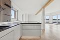 Skyline-Gefühl inklusive – Exklusives Penthouse mit Süd-West-Dachterrasse & Whirlpool - Küche