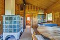 Charmantes Blockhaus in Spiegelberg: Auszeit, Weitblick und Natur pur auf großem Grundstück erleben! - Wohnzimmer EG