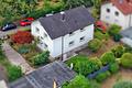 Charmantes Einfamilienhaus mit Garten, Garage & Hobbyraum – renovierungsbedürftig mit viel Potenzial - Hausansicht