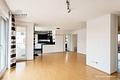 Moderne und lichtdurchflutete 3-Zimmer-Wohnung mit Sonnenbalkon und Tiefgaragenstellplatz - Wohnbereich