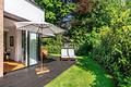 Juwel in zauberhafter Gartenlage: stilvoll modernisierte Haushälfte - Sichtgeschützter Sonnengarten