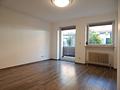 2-Zimmer-Wohnung in Freilassing mit Balkon & Holzofen – gepflegt und vermietet - Wohnbereich