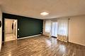 Helle Zweizimmerwohnung mit Garten und TG-Stellplatz - Wohnzimmer