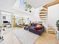 zur Kapitalanlage: Schöne Maisonette-Dachterrassenwohnung mit großem Ostbalkon in Taufkirchen - Wohnbereich 
