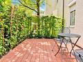 Ruhige 2-Zimmer-Erdgeschosswohnung mit geschützter Ostterrasse in München-Bogenhausen - Ostterrasse