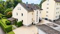 Interessantes Mehrfamilienhaus mit 6 Wohneinheiten und großem Grundstück in Rosenheim! - Blick zum Haus