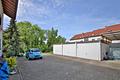 Gemütliche 1,5-Zimmer-Erdgeschosswohnung mit Terrasse in guter Lage von Hockenheim - Hof mit Garage