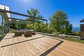 Rarität mit Alpen-Panorama und Seezugang: Ikonische Architekten-Villa mit hoher Privatsphäre - Atemberaubende Rooftop-Terrasse