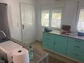 Villa mit 3 Schlafzimmern, 1 Badezimmer, Dachterrasse und Carport in ruhiger Lage