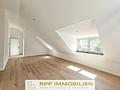 Neubau: Lichtdurchflutete 3-Zimmer-Wohnung mit großzügiger Süd/West-Dachterrasse - Wohnbereich