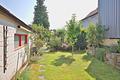 Doppelhaushälfte als Ein- oder Zweifamilienhaus mit Garage und sonnigem Garten - Garten