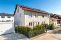 Zum Erstbezug: Hochwertige, energieeffiziente Haushälfte mit Einfamilienhaus-Charakter - Hübscher Vorgarten