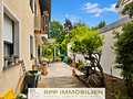 Attraktives Dreifamilienhaus mit stabilem Vermietungspotenzial und Entwicklungschancen - Süd-Terrasse Wohnung EG