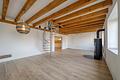 Wohnen mit Charakter: Maisonette-Wohnung in ausgebauter Scheune am Waldrand mit Sonnenterrasse - Wohnzimmer