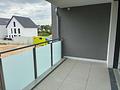 HEGERICH: Wohnträume werden wahr – Stilvolle Neubauwohnung mit sonnigem Balkon -  Balkon