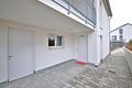 Modern wohnen am Ortsrand – 2-Zimmer-Neubauwohnung mit Terrasse und eigenem Gartenanteil - Eingang