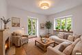 Altbauvilla mit Gewerbeanteil auf parkähnlichem Grundstück - Kaminzimmer (visualisiert)