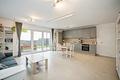 Moderne 2-Zimmer-Wohnung mit Terrasse und Garten in guter Lage - Wohn/-Essbereich Ansicht 2