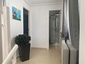 Villa mit 3 Schlafzimmern, 3 Bädern, Dachterrasse, Kfz-Stellplatz und Gemeinschaftspool