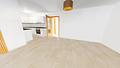 Vermietete und gepflegte 2-Zimmer-Wohnung mit Balkon in Freilassing zu verkaufen! - Wohnbereich Bild 1