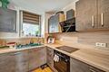 Neuwertige 2-Zimmer-Erdgeschosswohnung mit Terrasse, Garten und Stellplatz in Hockenheim - Küche